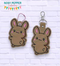 Load image into Gallery viewer, Happy Bunny snap tab and eyelet fob machine embroidery file (single and multi files included) MB Feb &#39;24 DIGITAL DOWNLOAD