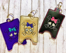 Load image into Gallery viewer, Bow Skull ITH Sanitizer Case machine embroidery design DIGITAL DOWNLOAD
