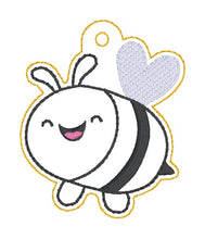 Load image into Gallery viewer, Happy Bee snap tabs, eyelet fobs, and bagtag set machine embroidery file (single and multi files included)--2026 Skill Builder Bundle--DIGITAL DOWNLOAD