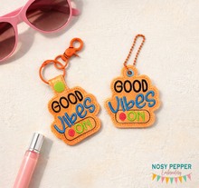 Load image into Gallery viewer, Good Vibes snap tab and eyelet fob (single and multi files included) machine embroidery file DIGITAL DOWNLOAD