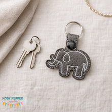 Load image into Gallery viewer, Elephant Minimalist Snap tab &amp; eyelet fob (Single and Multi file included) machine embroidery design DIGITAL DOWNLOAD