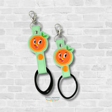 Load image into Gallery viewer, Orange Bird hair tie holder (2 sizes included) machine embroidery design DIGITAL DOWNLOAD