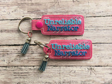 Load image into Gallery viewer, Unreliable Narrator snap tab and eyelet fob set (single and multi files included) machine embroidery design DIGITAL DOWNLOAD
