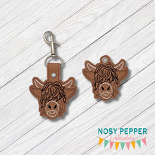 Load image into Gallery viewer, Highland Cow snap tab and eyelet fob machine embroidery file (single and multi files included) DIGITAL DOWNLOAD