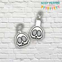 Load image into Gallery viewer, Cute Skull snap tab and eyelet fob machine embroidery file (single and multi files included) DIGITAL DOWNLOAD