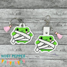 Load image into Gallery viewer, Mummy Frog snap tab and eyelet fob machine embroidery file (single and multi files included) DIGITAL DOWNLOAD