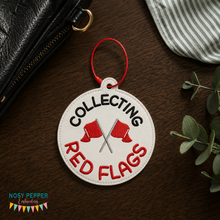 Load image into Gallery viewer, Collecting Red Flags bag tag/ornament/bookmark machine embroidery design DIGITAL DOWNLOAD