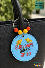 Load image into Gallery viewer, Surviving Out Of Spite bag tag/ornament/bookmark machine embroidery design DIGITAL DOWNLOAD