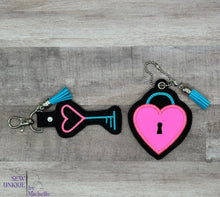 Load image into Gallery viewer, Heart lock applique eyelet fob and snap tab machine embroidery designs DIGITAL DOWNLOAD